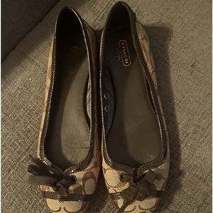 Vintage Coach logo brown and tan beautiful flats in a size 8.5.